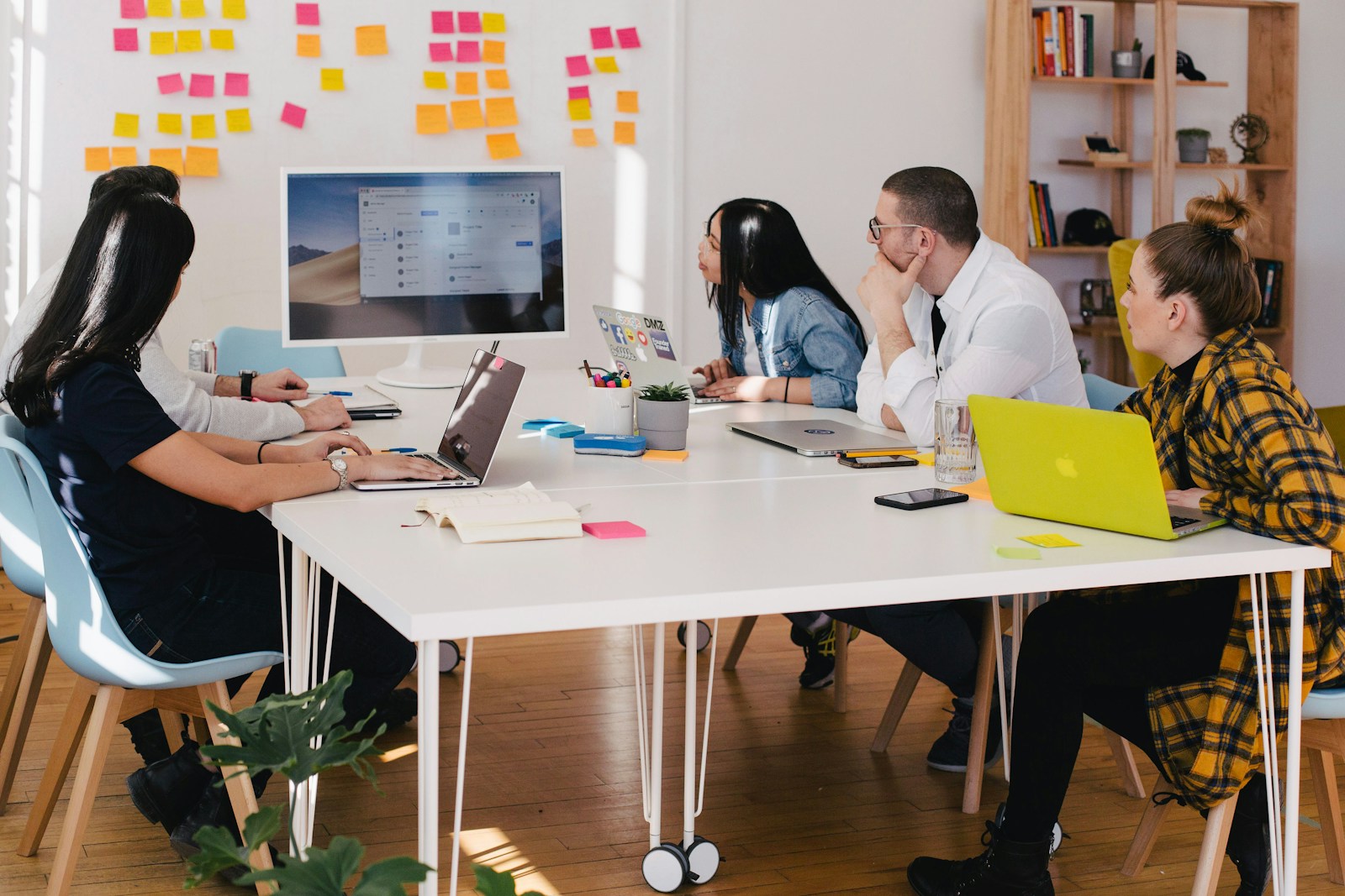 Mind Nexus AI team reviewing assistant evaluation results